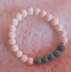 White lava stone bead and turquois bead bracelet.